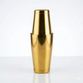 Solid brass cocktail shaker on a white background, featuring a polished finish that highlights its sleek design and elegant craftsmanship.