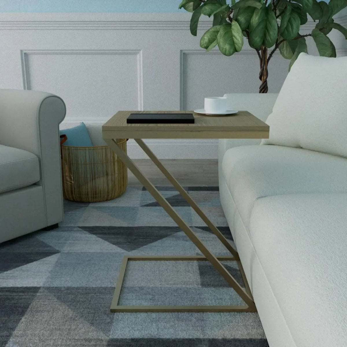 A modern side table with a light wood top and a gold-finished geometric metal frame, styled in a living room next to a white sofa on a gray patterned rug.