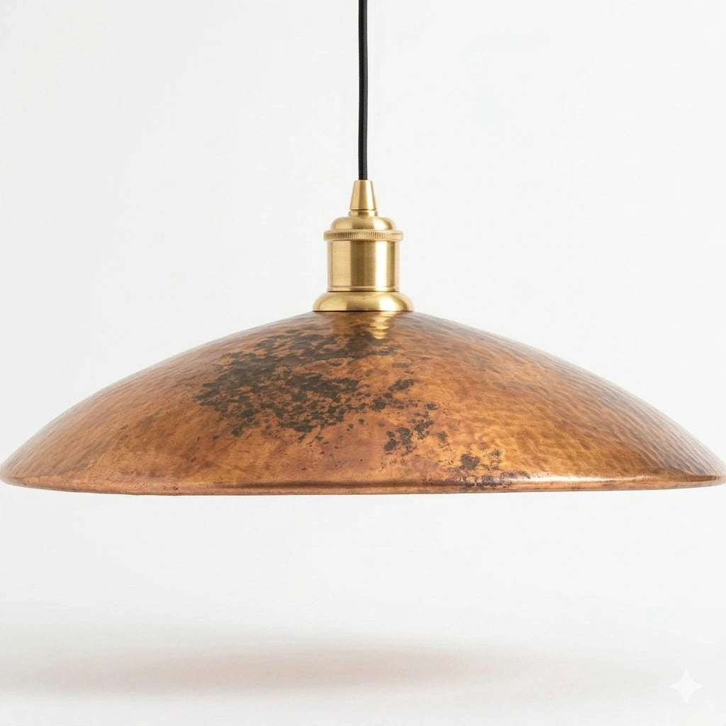 Copper pendant light for bar ceilings, featuring a warm metallic finish that casts soft, ambient lighting and adds a stylish, modern touch to the bar area.